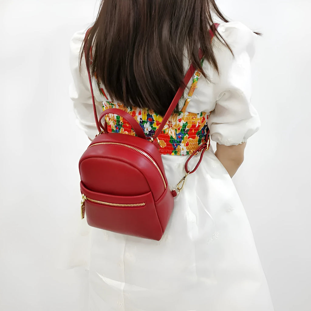 Soft PU mini backpack with large capacity showing three-dimensional pocket and street trend styling
