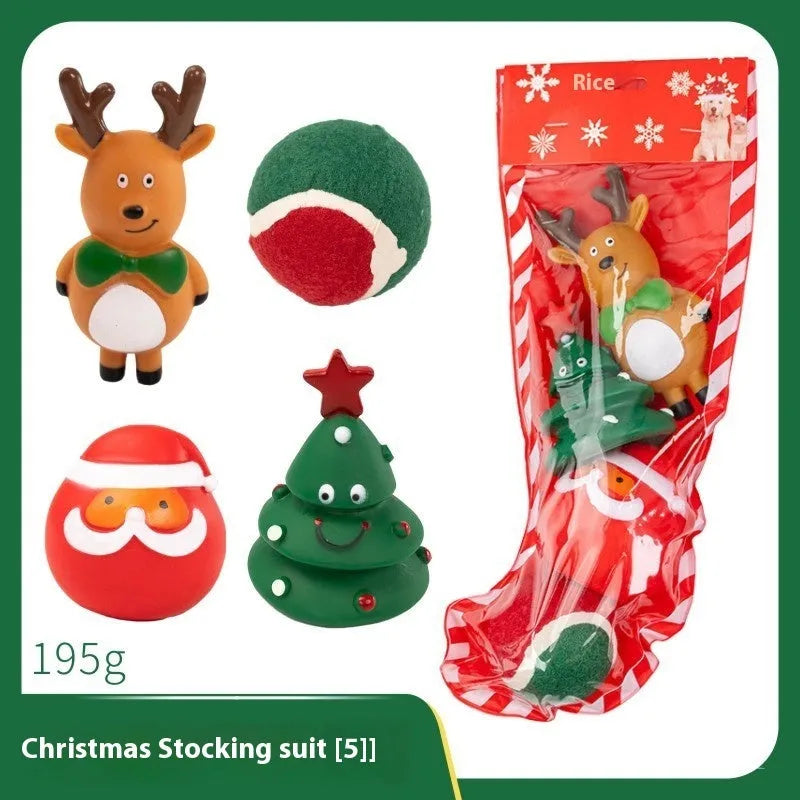 Set of colourful Christmas-themed vinyl dog chew toys including balls, ropes, and Santa figures.