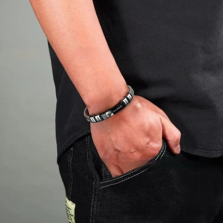 Men's titanium steel rope bracelet with heart-shaped lettering charm on wrist