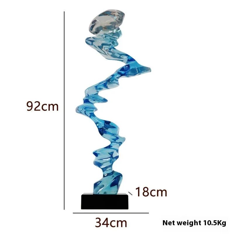Modern minimalist abstract sculpture in natural resin, available in bright gold, elegant silver, or phantom blue.