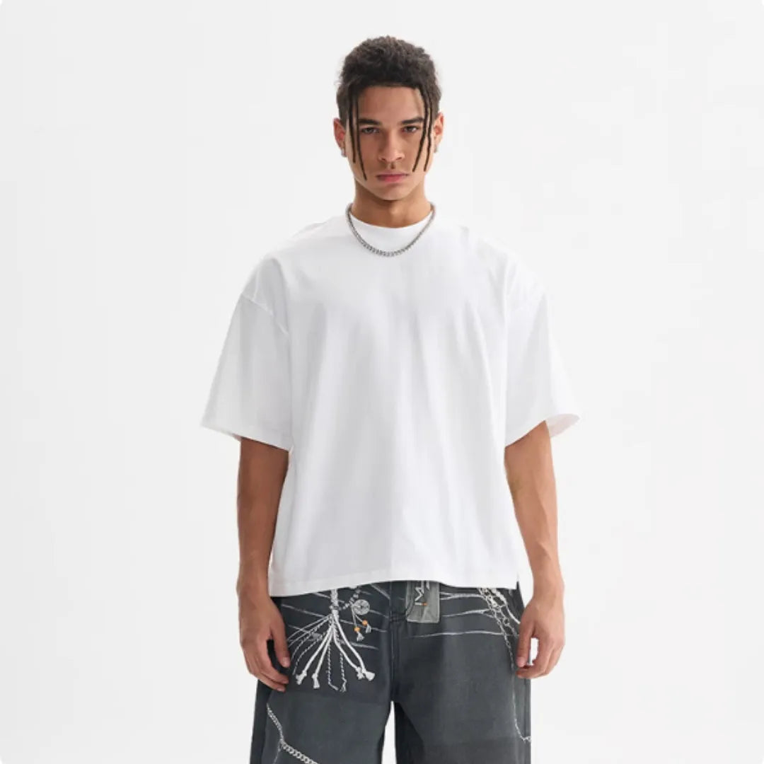 American style loose fit pure cotton t-shirt in apricot colour on a hanger.