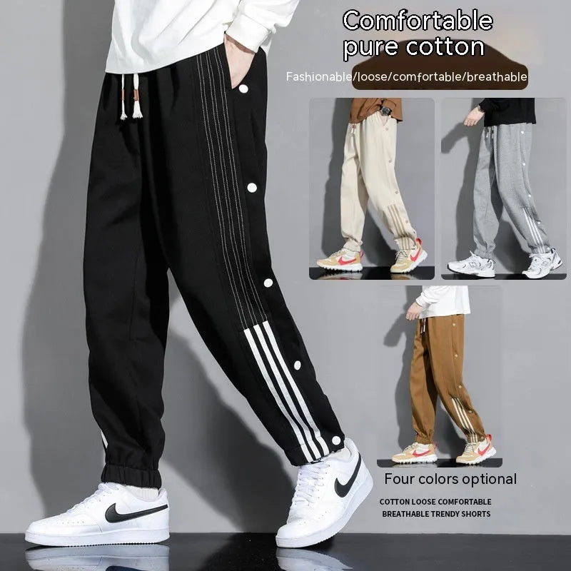 Men's loose grey sweatpants with ankle ties and belt, cotton blend fabric for autumn sports wear