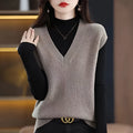 Sleeveless pullover vest with 3D knit pattern in creamy-white colour, shown on hanger