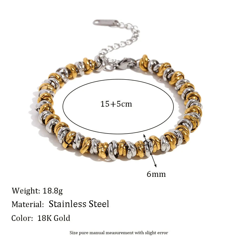 Gold colour jewellery set with geometry round ring design including earrings, necklace, and bracelet