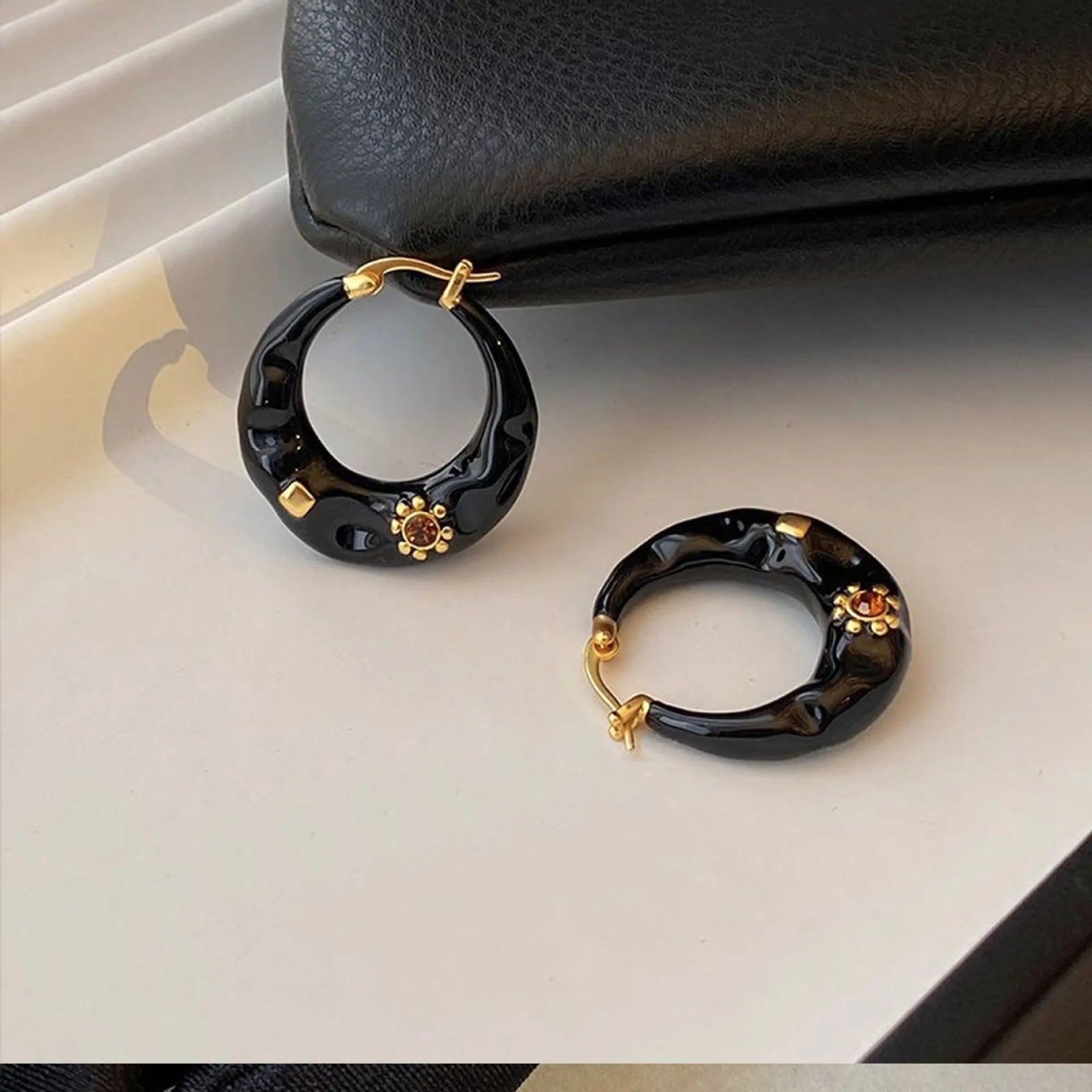 Retro style alloy ear studs with rhinestone decoration in black and red colours