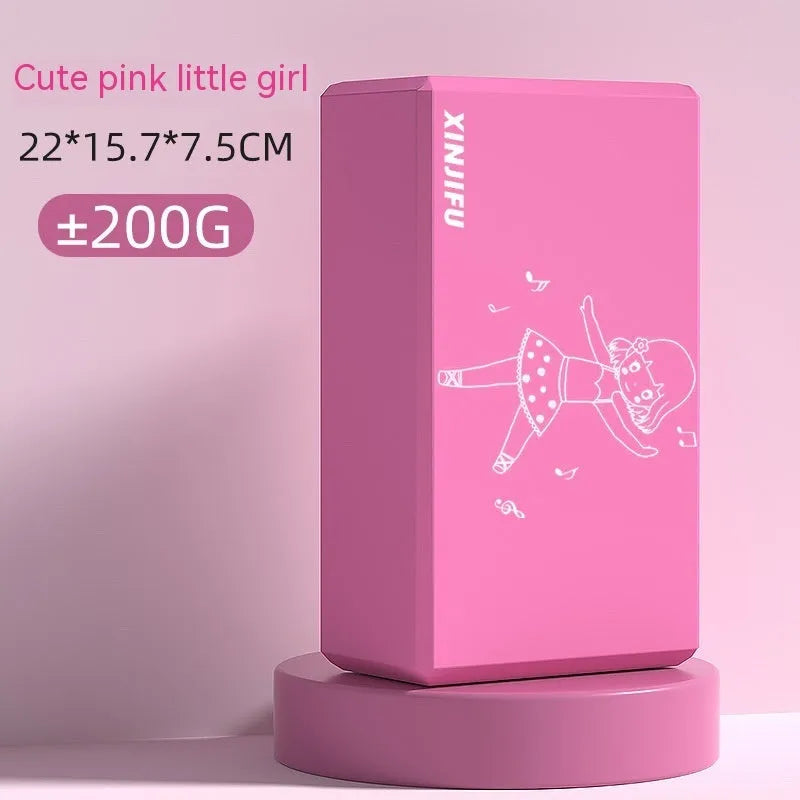 High-density EVA yoga block in violet colour next to a pink block with a cartoon print design.