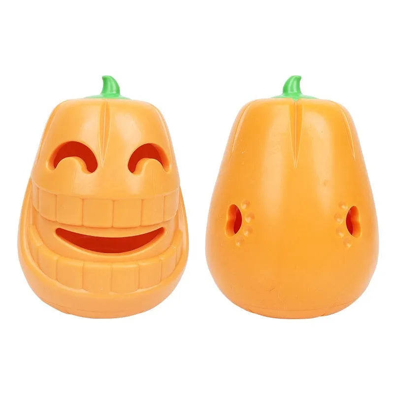 Orange Halloween pumpkin shaped rubber dog toy with a treat-dispensing funnel.