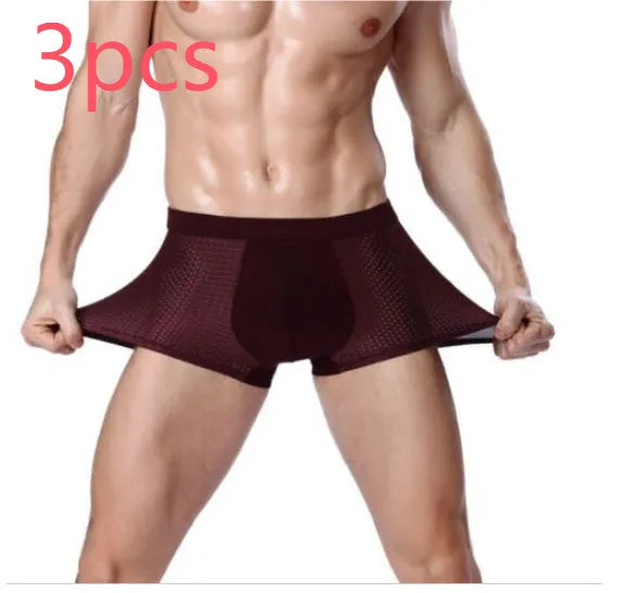Men's solid colour ice silk modal boxer briefs with U-type convex design and mesh fabric.