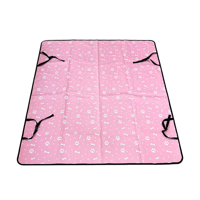 Dog car seat protector mat on rear bench seats in grey dog footprints pattern