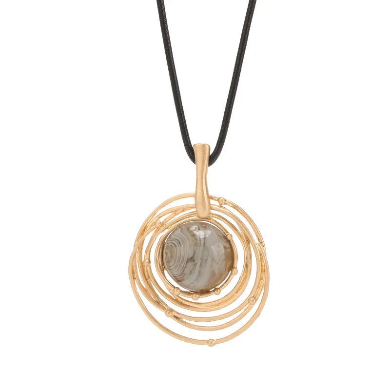 Gold tone geometric pendant necklace with snake chain for women, adjustable up to 80cm.