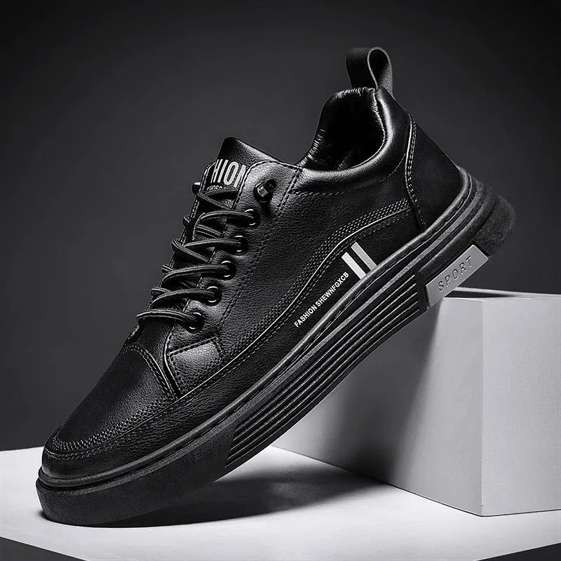 Men's low-top skateboard shoes with elastic band in white or black colour with stitching details