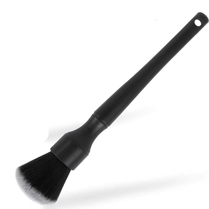 Black car detailing brush with super soft pig hair bristles shown in large and small sizes.