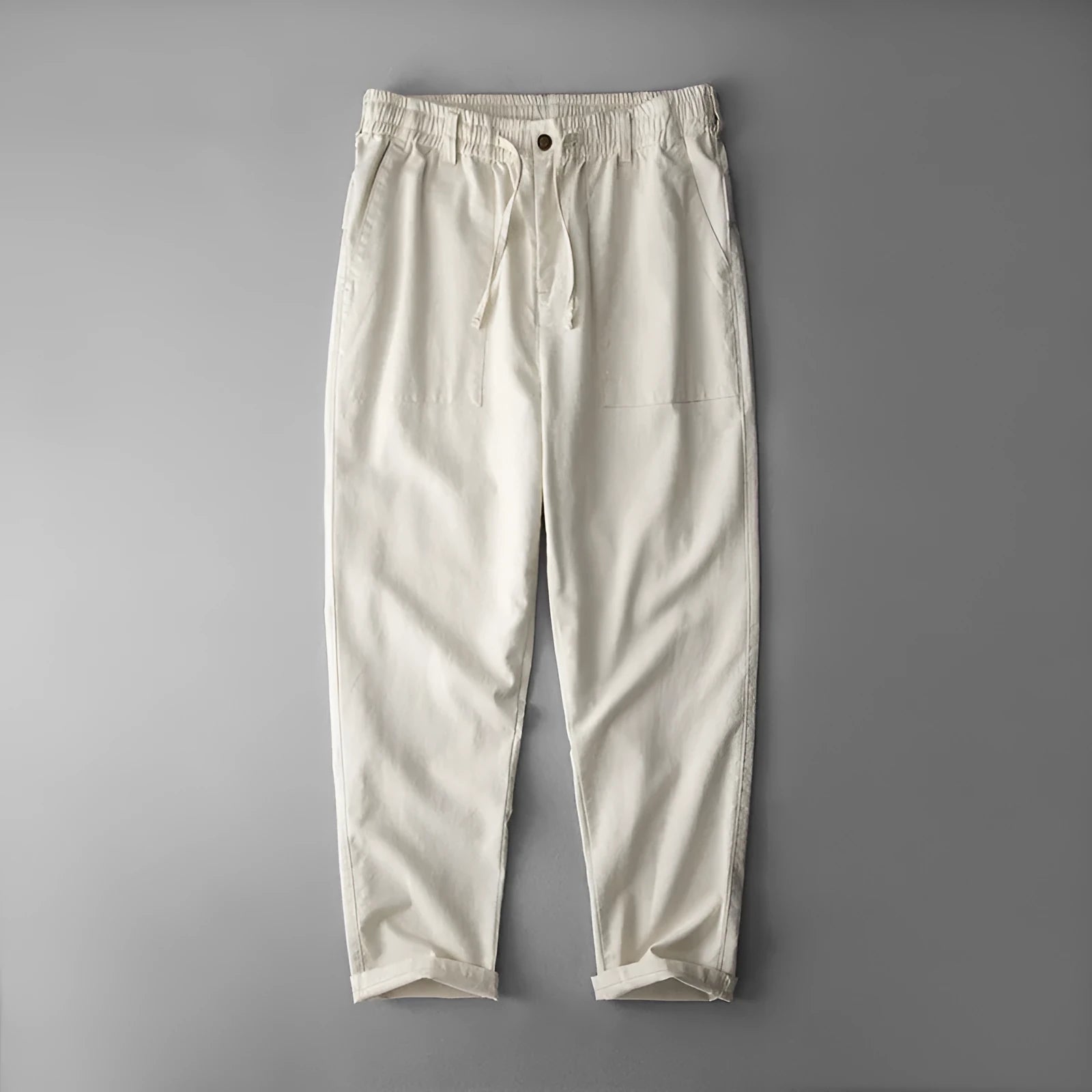 Men's casual linen trousers in solid colour with mid waist design available in navy blue, apricot linen, or grey