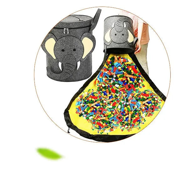 Green felt cube storage bag with pull rope serving as toy organiser and play mat