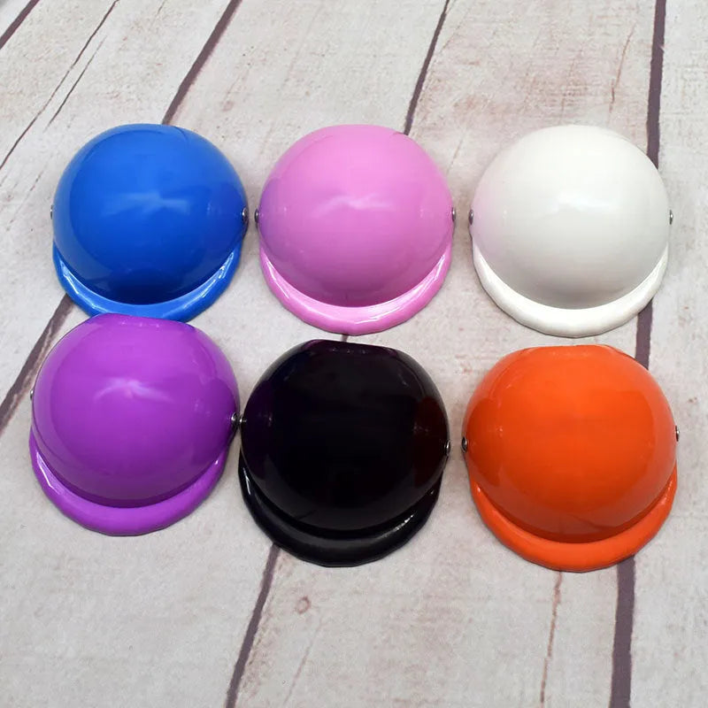 Plastic dog motorcycle cap helmet shown in multiple colours with Japanese style design