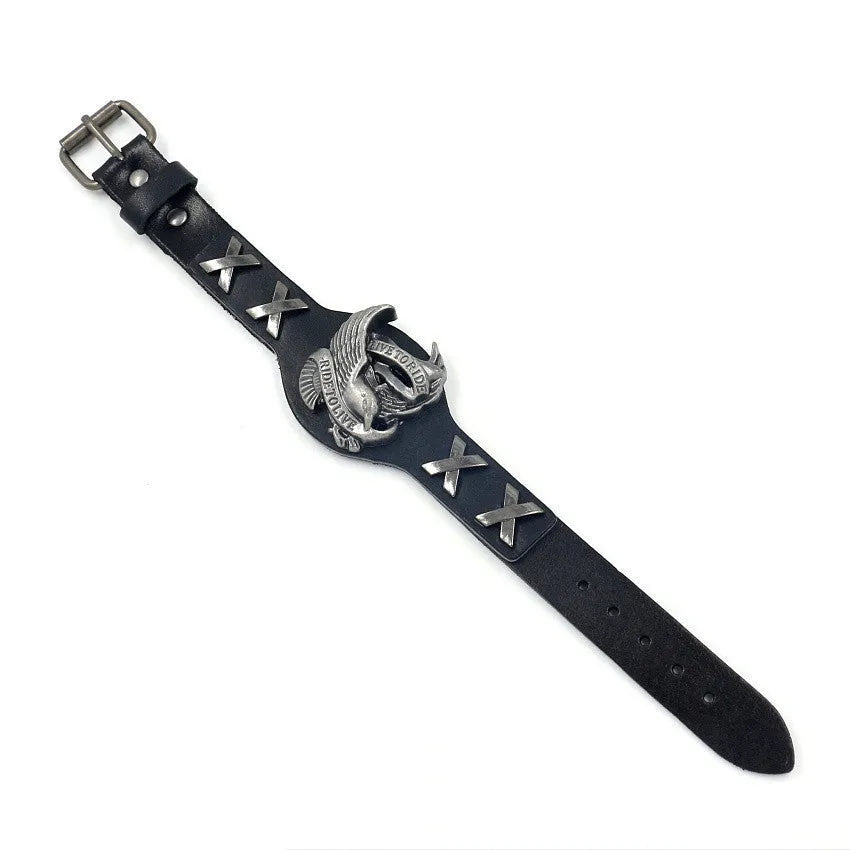 Black geometric leather bracelet with a silver watch-button clasp on a unisex wrist.
