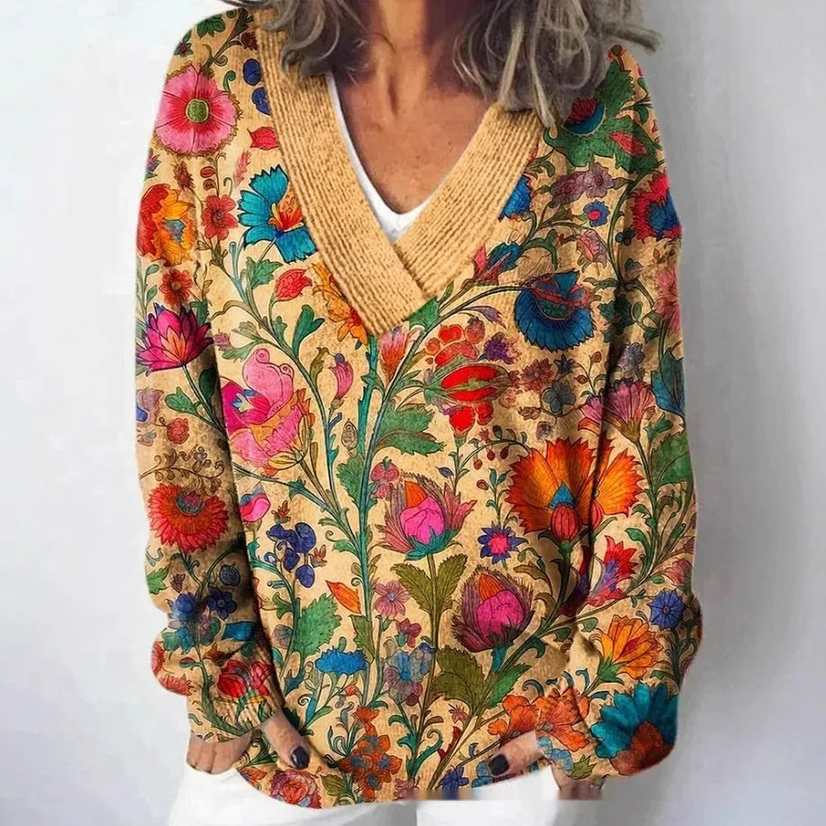 Women's V-neck long sleeve sweatshirt with a blue and white 3D floral print pattern.