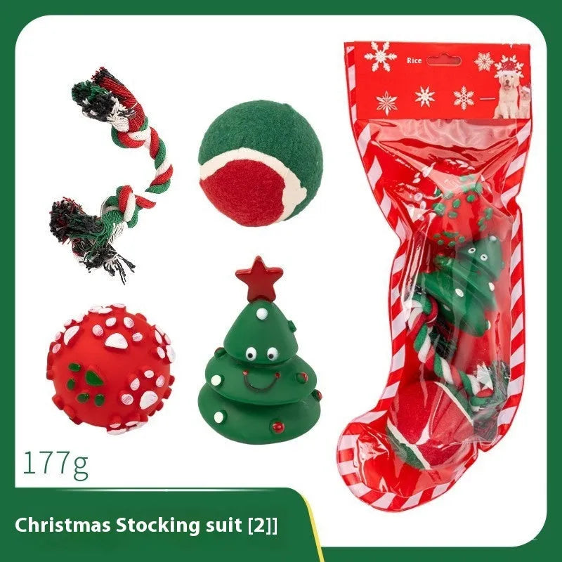 Set of colourful Christmas-themed vinyl dog chew toys including balls, ropes, and Santa figures.