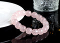 Pink natural crystal barrel bead bracelet with geometric 11mm x 12mm beads.