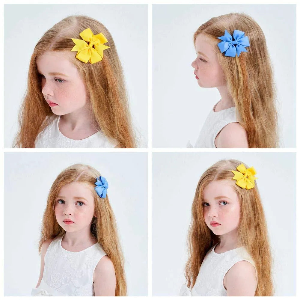 Assortment of 20 colourful handmade grosgrain ribbon hair bows with alligator clips for toddlers.