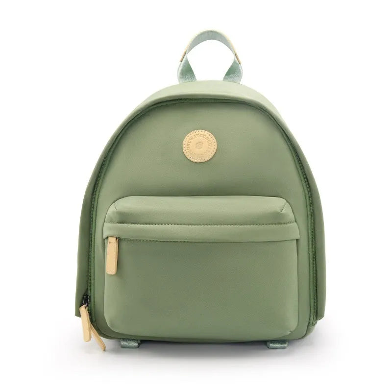 Women's solid-colour shoulder camera bag with a detachable iPad pocket in splash-proof polyester fabric.
