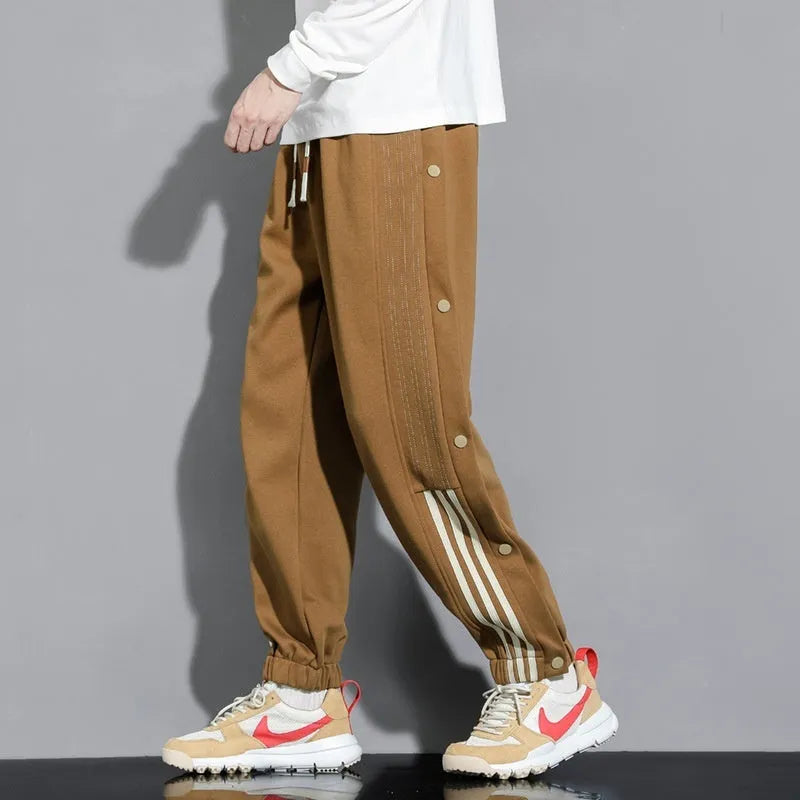 Men's loose grey sweatpants with ankle ties and belt, cotton blend fabric for autumn sports wear