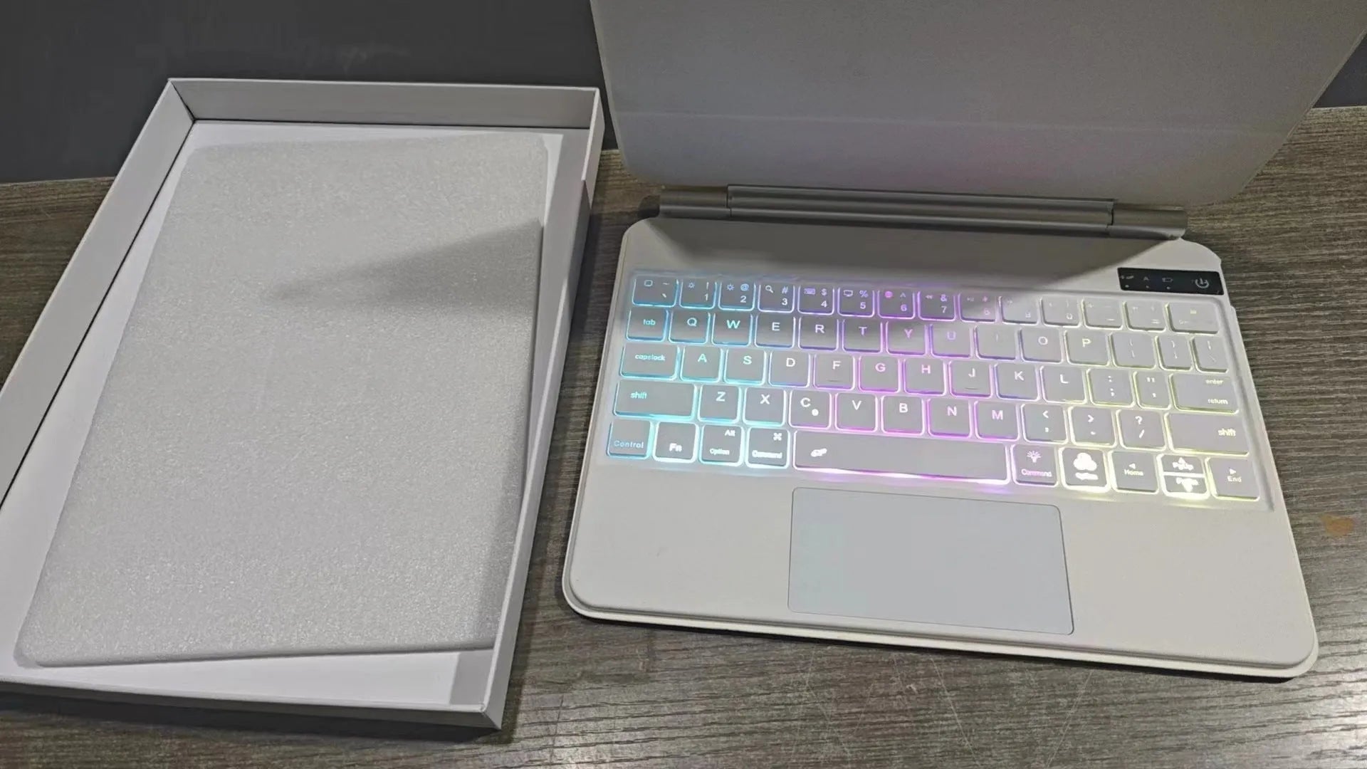 Suspension Magic Bluetooth keyboard with magnetic iPad attachment in black white pink purple or blue