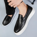 Casual slip-on shoes in white, black and white, and khaki colours with round toe design
