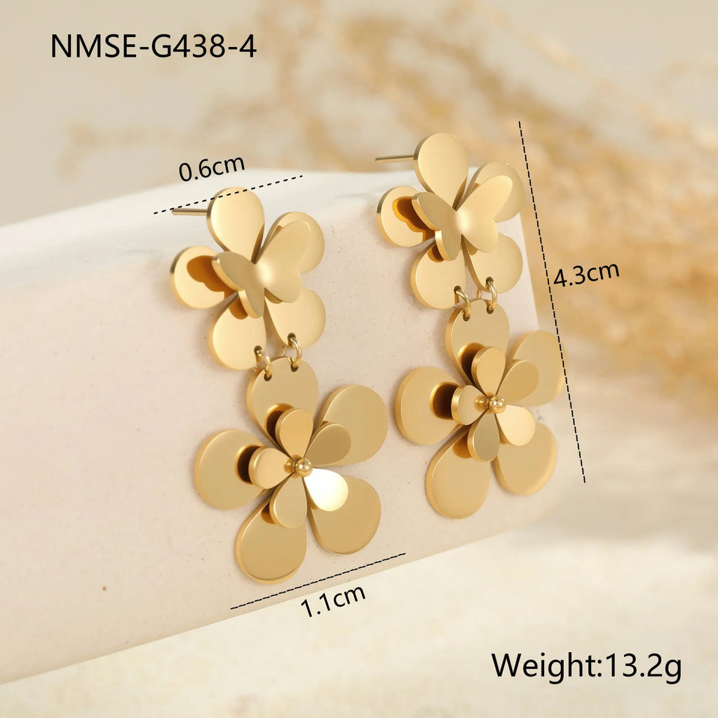 Gold-coloured stainless steel earrings with flower and butterfly design for women