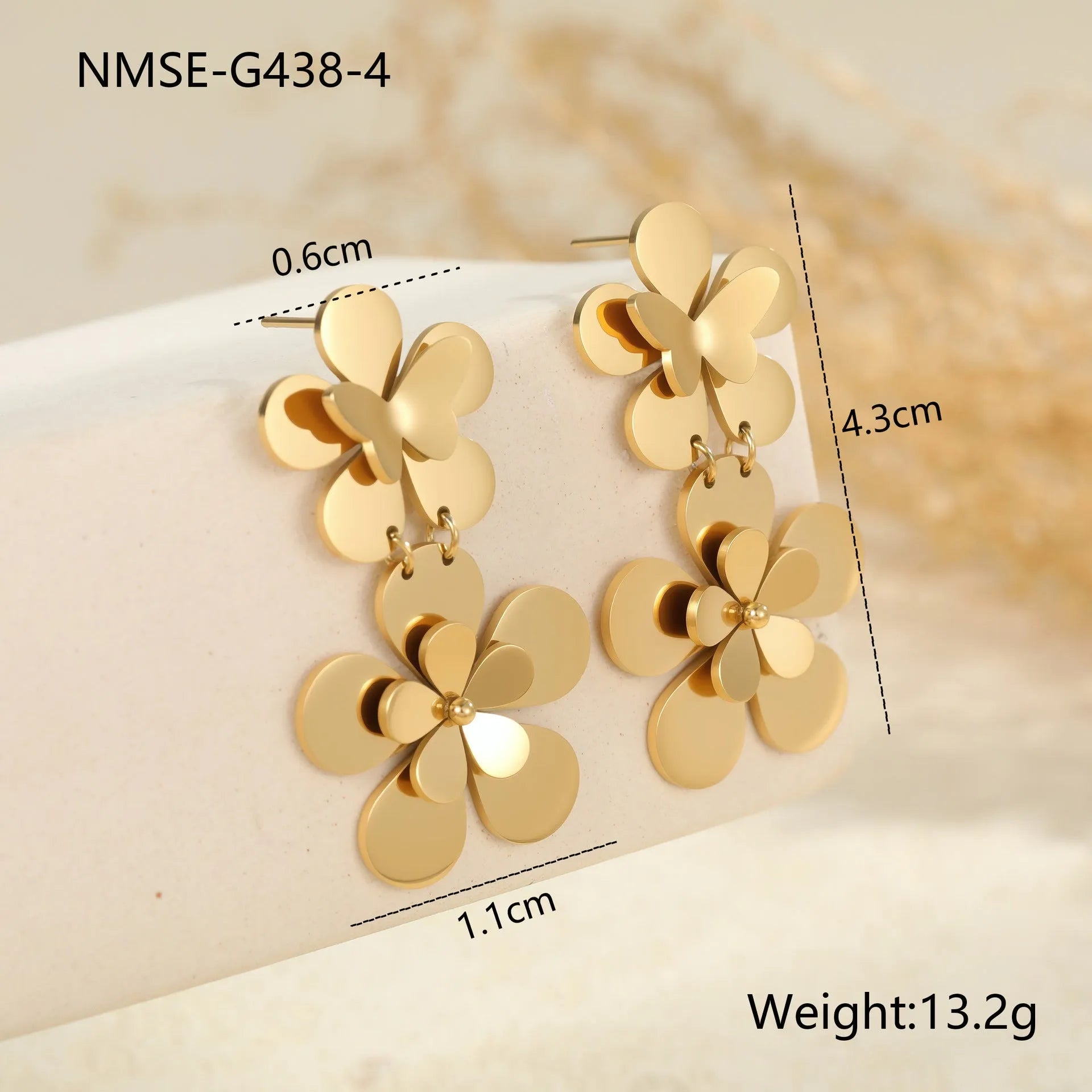 Gold-coloured stainless steel earrings with flower and butterfly design for women