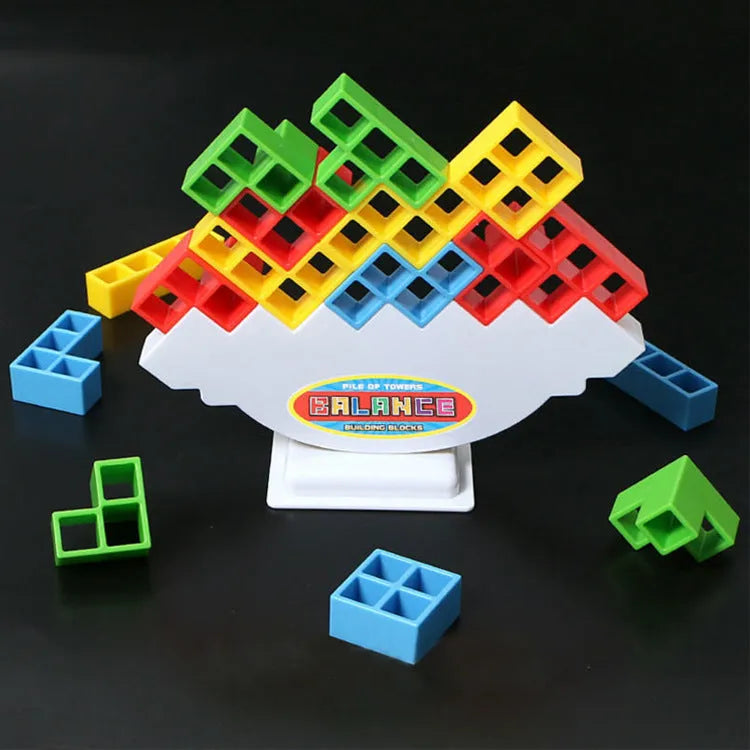 Plastic balance stacking game with 16 colourful building blocks, chassis, and base on a 26.5cm board.