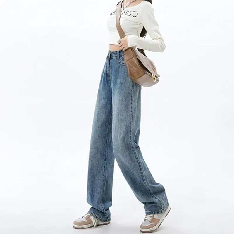 Women's retro blue high-waist wide-leg jeans laid flat, showing straight leg cut and denim texture.