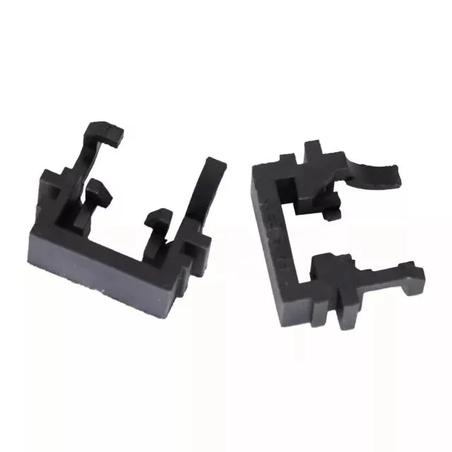 Black plastic Ford LED headlight adapter for H1 halogen to LED conversion