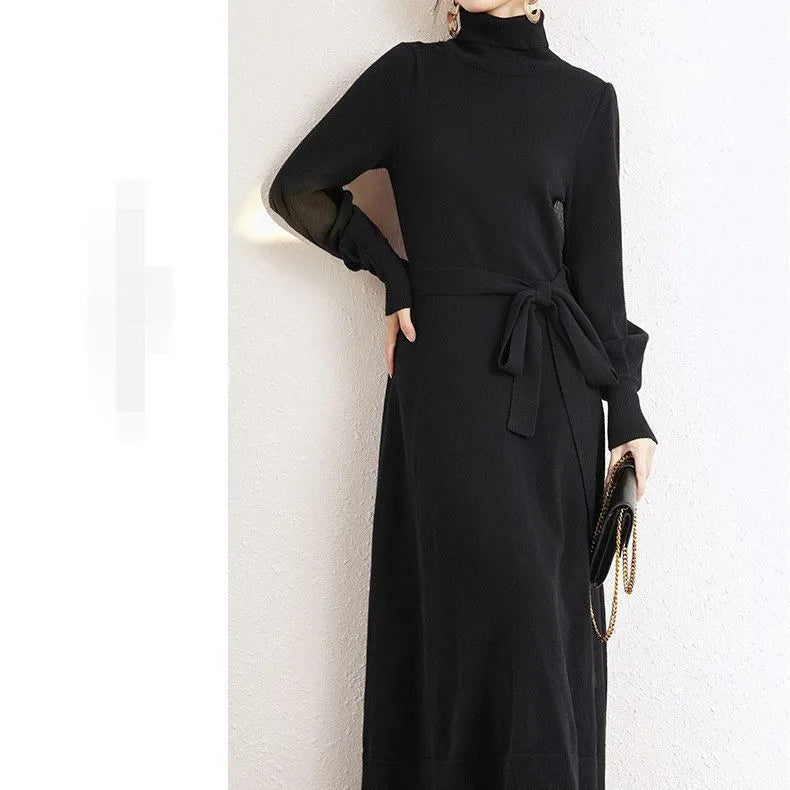 A rose red loose-fit turtleneck knit dress for women with long sleeves and a mid-length flared skirt.