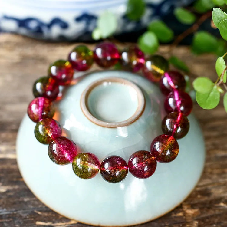 Women's watermelon crystal bracelet showing handcrafted beads in pastoral casual style