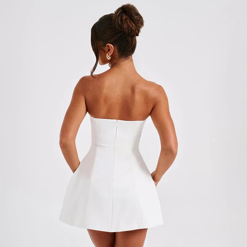 Women's solid colour backless tube dress with high waist and A-line short skirt.