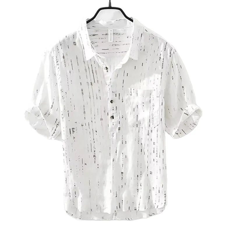 Men's loose fit short sleeve polo shirt in black, showing lapel collar and cardigan style