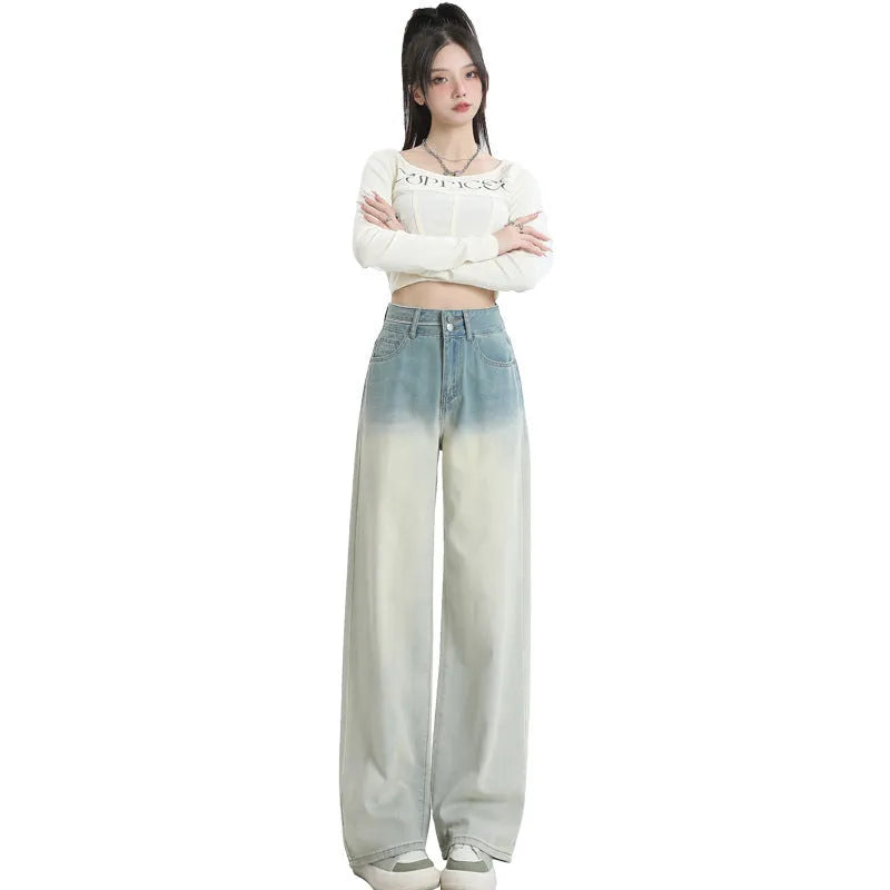 Women's straight-leg cotton denim trousers in a gradient blue colour with a wide leg fit.