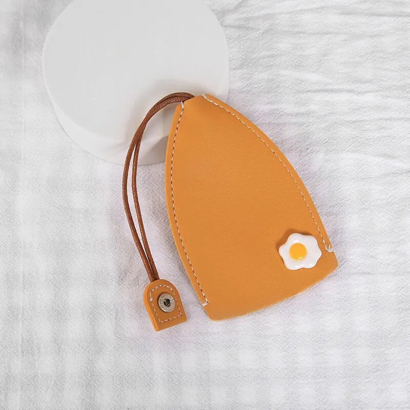Cartoon pull-out key case in PU leather with colourful design, showing compact 14cm by 7.5cm dimensions