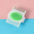 Blue and green multifunctional pet comb for dog grooming with hair removal, massage, and flea control features