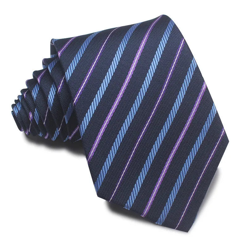 Close-up of a red, black, and blue striped men's formal tie with a textured Jacquard weave.