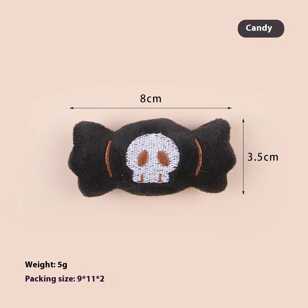 Handheld plush cat teaser toy with candy design on small wand for interactive play