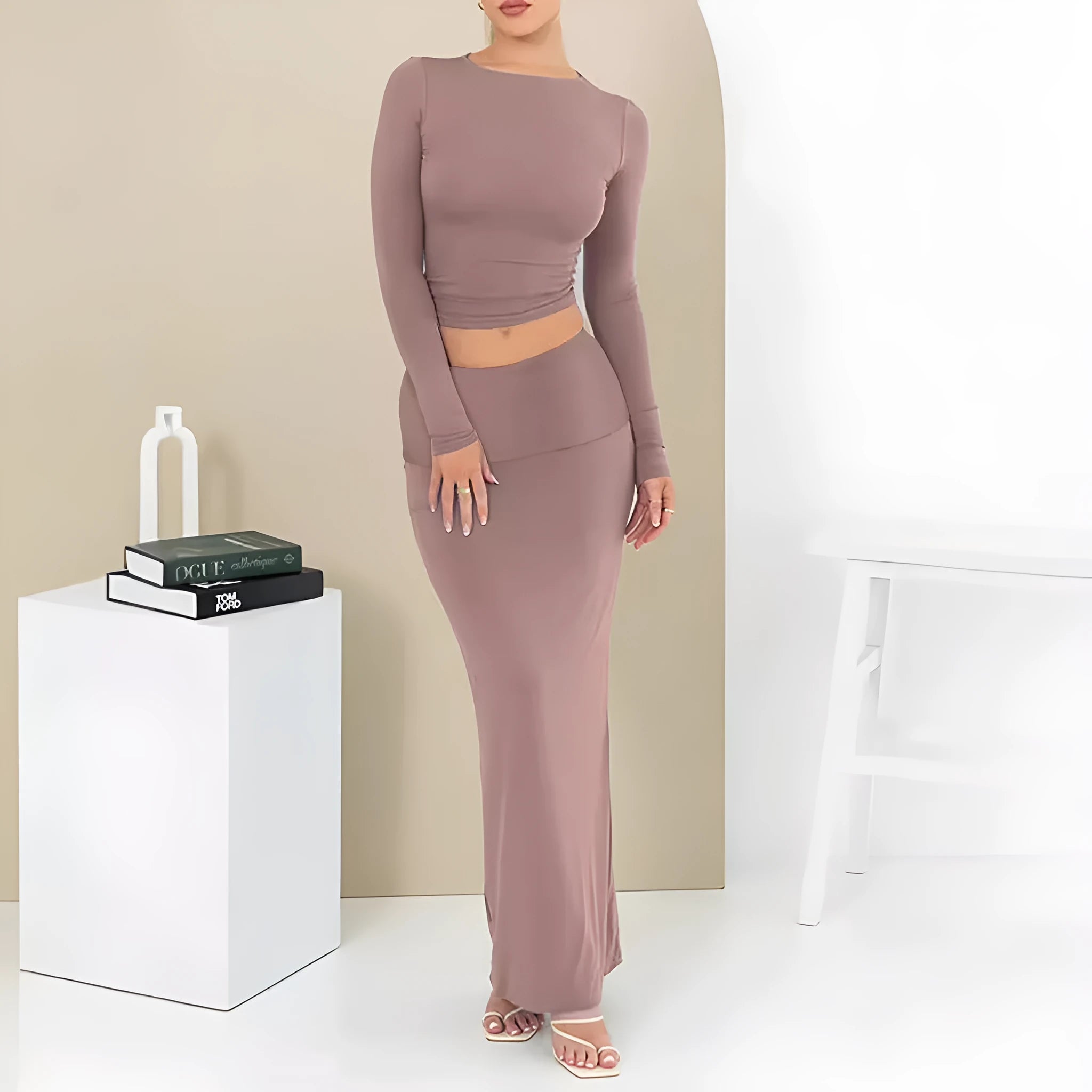 Women's black sweet style polyester two-piece suit with exposed navel and three-quarter sleeves.