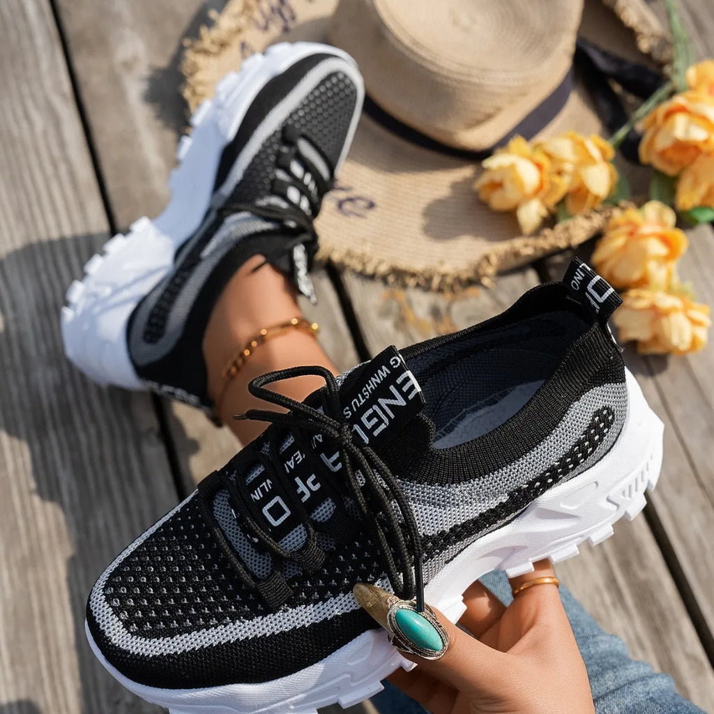Women's Flyknit mesh lace-up sneakers in multiple colour options with rubber sole