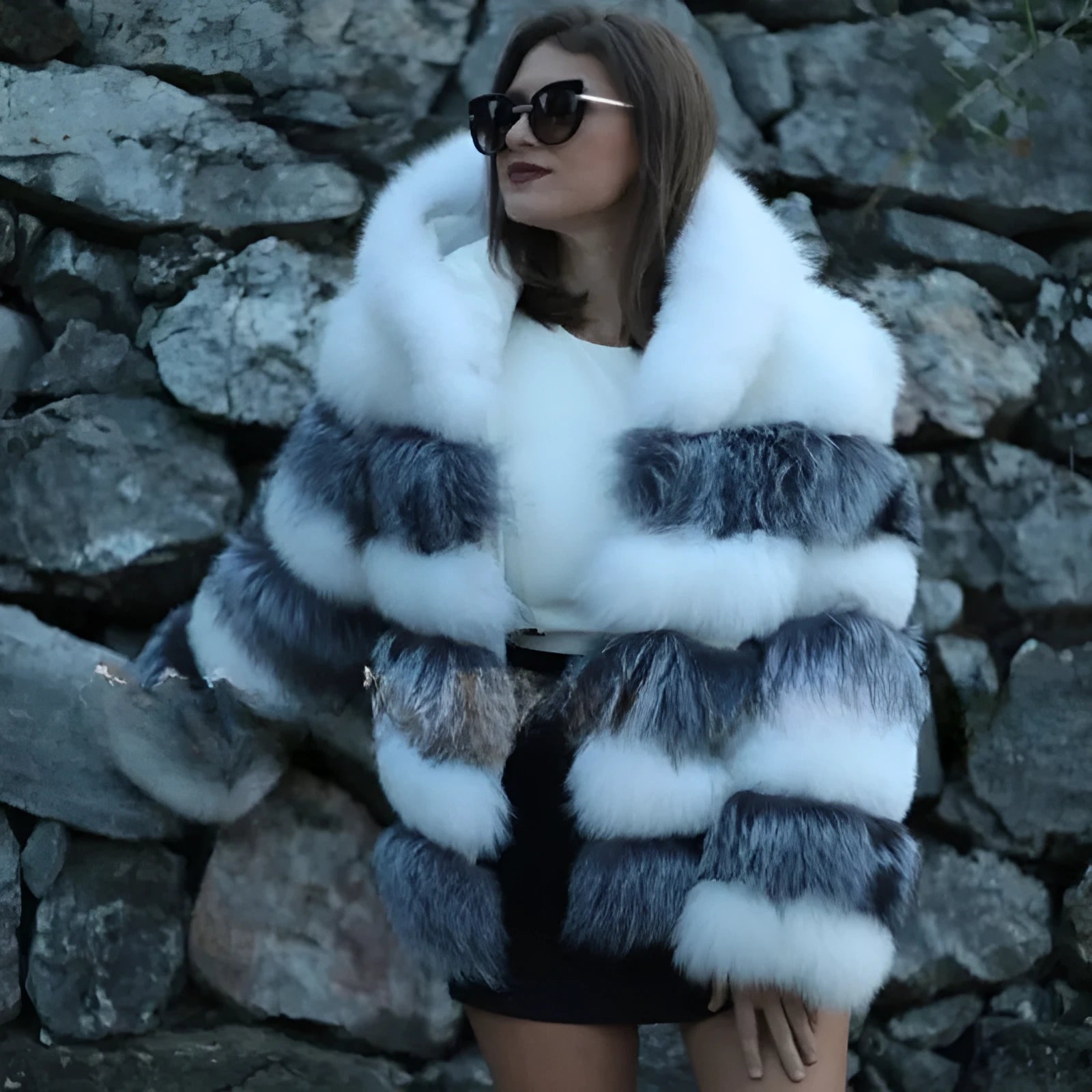 Women's loose hooded faux fur coat in street fashion style showing brown colour option