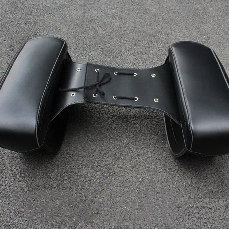 Black retro style PU leather motorcycle saddle bag mounted on a bike side.