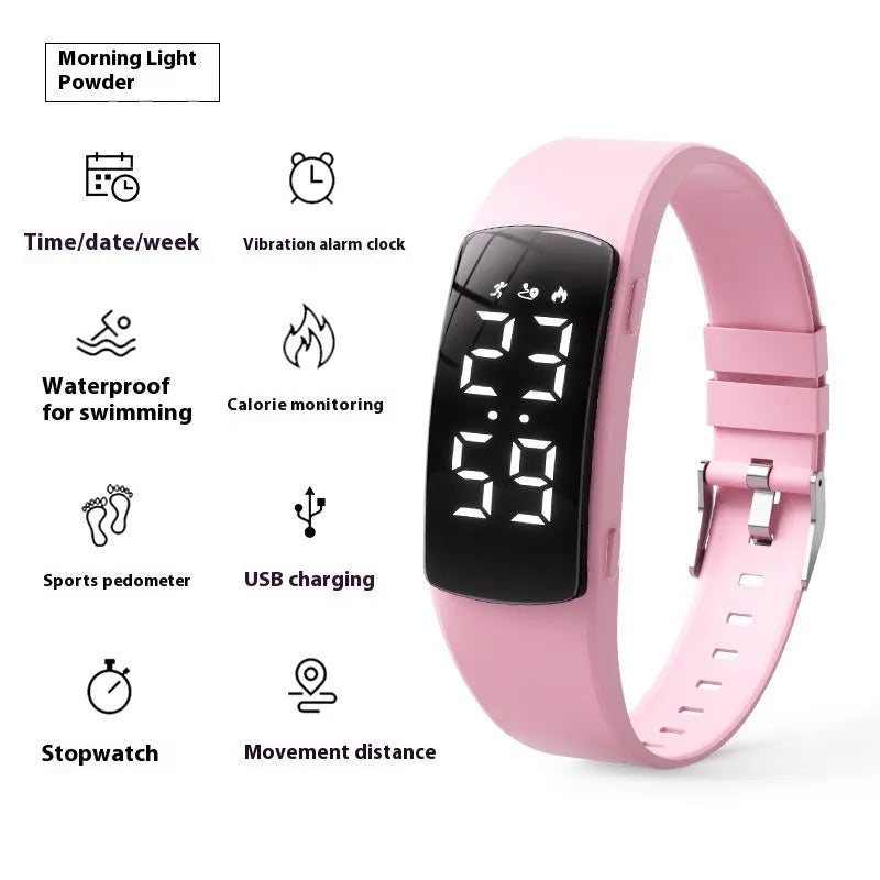 Black vibration alarm smart watch with LED display and silicone strap on a wrist.