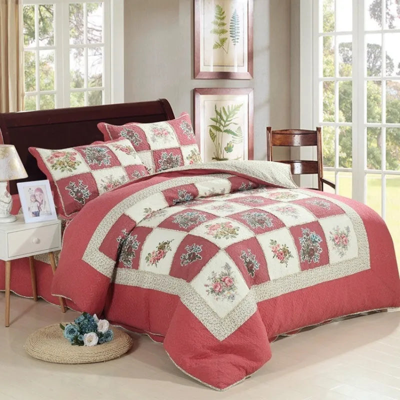 Washed pure cotton quilted bedspread set with one large cover and two pillowcases on a bed.