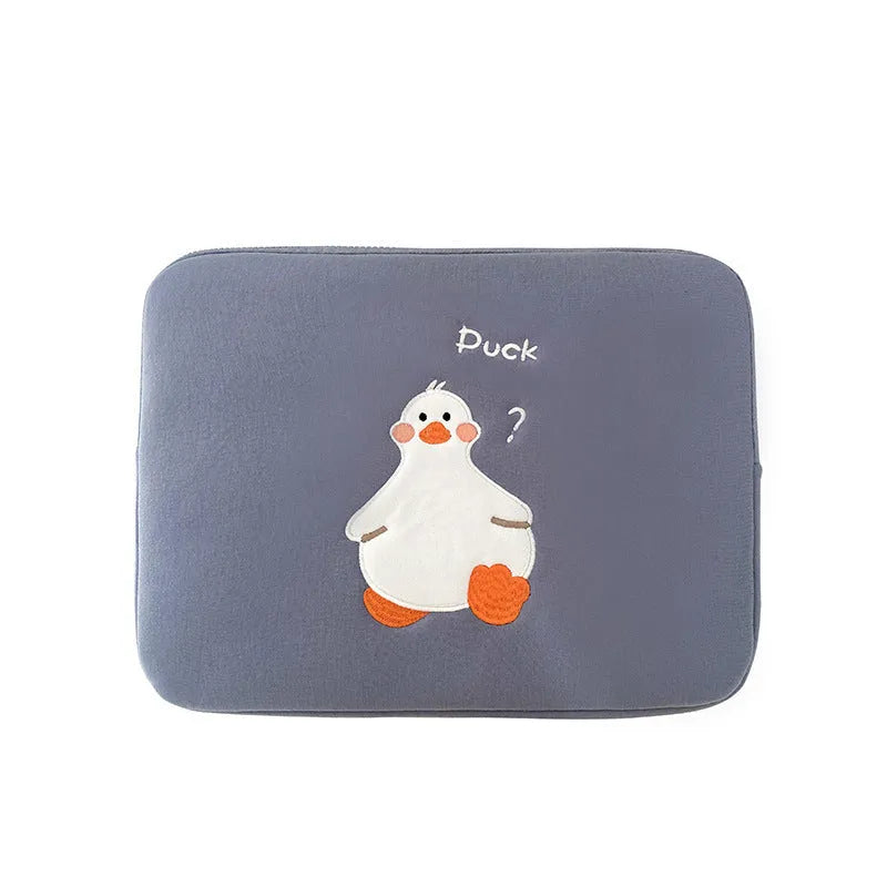 Blue cotton tablet case with embroidered cartoon duck design and zipper closure