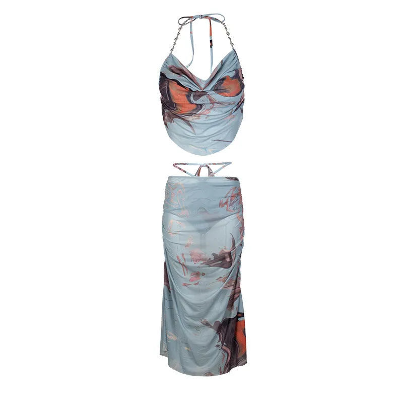 Blue women's three-piece bikini with diamond chain pattern and backless design